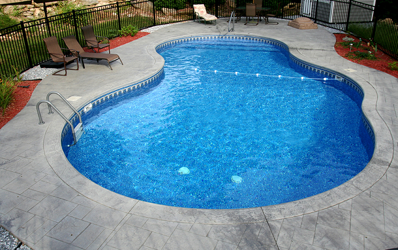 Swimming pool and stamped concrete project example 81